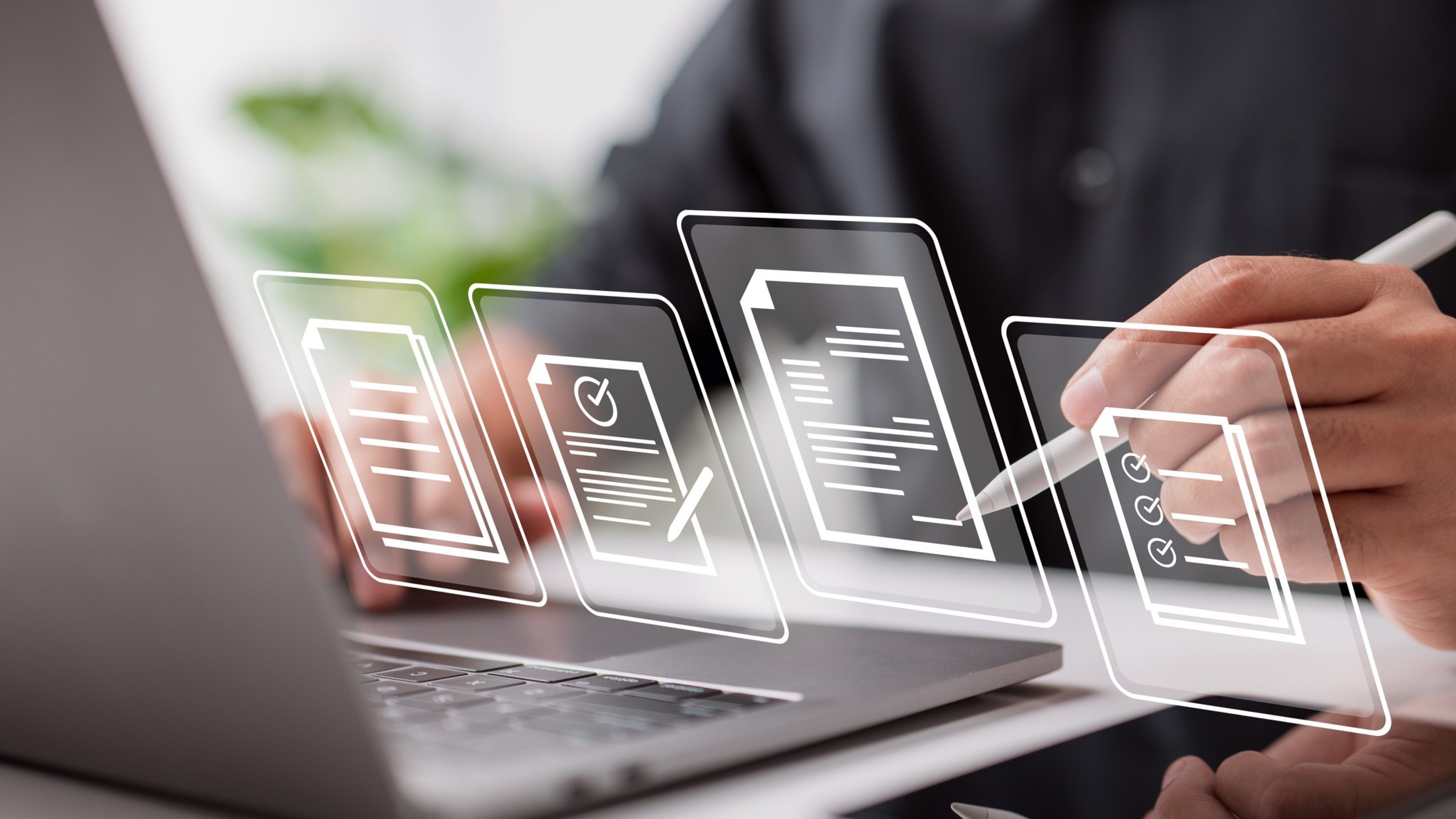 Paperless workplace idea, e-signing, electronic signature, document management. Businessman signs an electronic document on a digital document on a virtual notebook screen using a stylus pen.